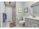Well-lit bathroom featuring modern fixtures, tile flooring, and neutral decor at 113 Marina Ln, Mooresville, NC 28117