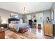 Spacious main bedroom with ample natural light and gorgeous wood-look flooring at 113 Marina Ln, Mooresville, NC 28117
