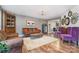 Spacious living room with hardwood floors, ample seating, and unique decorative accents at 113 Marina Ln, Mooresville, NC 28117