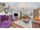 Cozy living room featuring hardwood floors, comfortable seating, and charming decor at 113 Marina Ln, Mooresville, NC 28117
