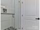 Beautiful bathroom with glass-enclosed tiled shower featuring star pattern tile and modern fixtures creating a tranquil space at 115 Falling Creek Dr, Statesville, NC 28625