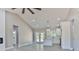 Open concept living area with a view to the kitchen and bathroom at 115 Falling Creek Dr, Statesville, NC 28625