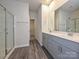 Modern bathroom with a double vanity, walk-in shower, and neutral color scheme at 1223 Morehead Dr, Salisbury, NC 28144