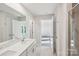 Bright bathroom featuring a dual sink vanity, tile flooring, and neutral wall colors at 125 Canoga Ave, York, SC 29745