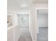 Upstairs hallway with a view of the laundry room and another bedroom at 125 Canoga Ave, York, SC 29745