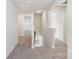 Upstairs hallway with carpet and natural light at 125 Canoga Ave, York, SC 29745