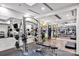 A modern gym featuring state-of-the-art weightlifting equipment and fitness accessories in a well-lit space at 127 N Tryon St # 404, Charlotte, NC 28202