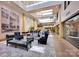 A grand lobby with high ceilings, elegant furnishings, and a stylish design, perfect for residents and visitors at 127 N Tryon St # 404, Charlotte, NC 28202