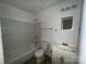 Full bathroom with white finishes, vanity, mirror, and a tub at 13134 Homewood Dr, Charlotte, NC 28262