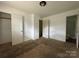 Bedroom with carpet flooring and access to an ensuite bathroom at 13134 Homewood Dr, Charlotte, NC 28262