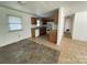 Bright kitchen area featuring wooden cabinets, essential appliances, and a practical layout at 13134 Homewood Dr, Charlotte, NC 28262