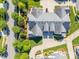 Expansive home featuring a multi-car driveway, lush landscaping, and an intricate roof design at 1328 Somersby Cir, Gastonia, NC 28054