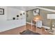 Upstairs loft featuring a desk area with wood floors and neutral tones at 1328 Somersby Cir, Gastonia, NC 28054
