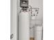The utility room features a water filtration system with modern appliances for efficient home maintenance at 1328 Somersby Cir, Gastonia, NC 28054