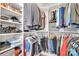 Bright walk-in closet with ample shelving, hanging space, and organized storage at 1328 Somersby Cir, Gastonia, NC 28054