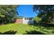 Extensive backyard offers privacy and room for outdoor activities and relaxation at 133 Pine State Rd, Troutman, NC 28166