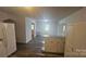 Charming kitchen boasts modern appliances, wood flooring, and ample cabinet space at 133 Pine State Rd, Troutman, NC 28166