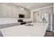 Modern kitchen featuring white countertops, stainless steel appliances and stylish gray cabinets at 145 Satchel Ct, Mooresville, NC 28115