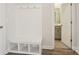 Mudroom with bench seating, storage cubbies, and access to a half bathroom at 145 Satchel Ct, Mooresville, NC 28115