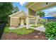 Backyard with a covered patio, manicured lawn and fenced in area for a secure and relaxing outdoor space at 15714 Laurel Oak Cres, Davidson, NC 28036