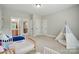 Bright bedroom with twin beds and teepee at 15714 Laurel Oak Cres, Davidson, NC 28036