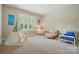 Bright bedroom with twin beds, teepee, and large window at 15714 Laurel Oak Cres, Davidson, NC 28036