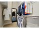 Walk-in closet with ample storage space, including shelves and hanging rods, well-organized for clothing and accessories at 15714 Laurel Oak Cres, Davidson, NC 28036