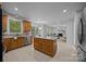 Bright kitchen with spacious island and stainless steel appliances at 15831 Breton Brook St, Huntersville, NC 28078