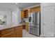 Kitchen with island and stainless steel refrigerator at 15831 Breton Brook St, Huntersville, NC 28078