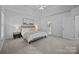 Spacious main bedroom with tray ceiling and neutral decor at 15831 Breton Brook St, Huntersville, NC 28078