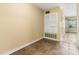Hallway with built in shelving unit, tile floor, and bay window at 160 17Th Street Nw Pl, Hickory, NC 28601