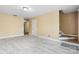 Bright living room featuring wood-look floors, neutral walls, and staircase at 160 17Th Street Nw Pl, Hickory, NC 28601