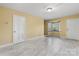 Neutral living room with wood-look flooring, recessed lighting, and large bay window at 160 17Th Street Nw Pl, Hickory, NC 28601