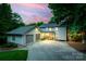 Charming two-story home with attached garage and ample parking at 18028 Broken Woods Rd, Charlotte, NC 28278