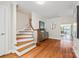 Elegant foyer with hardwood floors and a staircase at 18028 Broken Woods Rd, Charlotte, NC 28278
