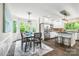 This kitchenette area features a dining nook and stainless steel appliances at 18028 Broken Woods Rd, Charlotte, NC 28278