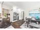 Cozy kitchenette area with built-in appliances and adjacent dining table at 18028 Broken Woods Rd, Charlotte, NC 28278