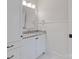 Well-lit bathroom with granite countertop, white cabinets, and modern finishes at 18705 Harbor Light Blvd, Cornelius, NC 28031