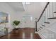 Elegant foyer showcasing hardwood floors, a staircase, and a decorative front door with sidelights at 18705 Harbor Light Blvd, Cornelius, NC 28031
