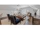 Spacious living area featuring a neutral color palette, plush seating and modern decor at 18705 Harbor Light Blvd, Cornelius, NC 28031