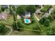 Stunning aerial view of backyard featuring a sparkling pool and lush landscaping at 188 Turnberry Ln, Mooresville, NC 28117