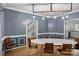 Well-lit dining room with modern chandelier and wainscoting at 188 Turnberry Ln, Mooresville, NC 28117