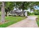 Inviting two-story home with a charming front porch and a long private driveway at 188 Turnberry Ln, Mooresville, NC 28117