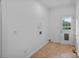 Mud room with tile flooring, access to the pool, and convenient exterior door at 188 Turnberry Ln, Mooresville, NC 28117