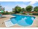 The bright blue pool features steps and a basketball hoop at 188 Turnberry Ln, Mooresville, NC 28117