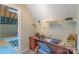 Versatile attic space with a desk and shelving, ideal for a hobby area or workspace at 2020 Olde Towne Dr, Monroe, NC 28110
