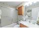 Cozy bathroom with a shower and bathtub combination and a vanity with storage at 2020 Olde Towne Dr, Monroe, NC 28110