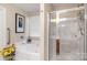 Bright bathroom featuring a separate tub and shower, creating a spa-like experience at 2020 Olde Towne Dr, Monroe, NC 28110