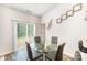 This dining area includes modern decor, wood flooring, and lots of natural light at 2030 Lanza Dr, Charlotte, NC 28215