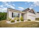 Charming one-story home with a well-manicured lawn and bright, natural sunlight at 2030 Lanza Dr, Charlotte, NC 28215